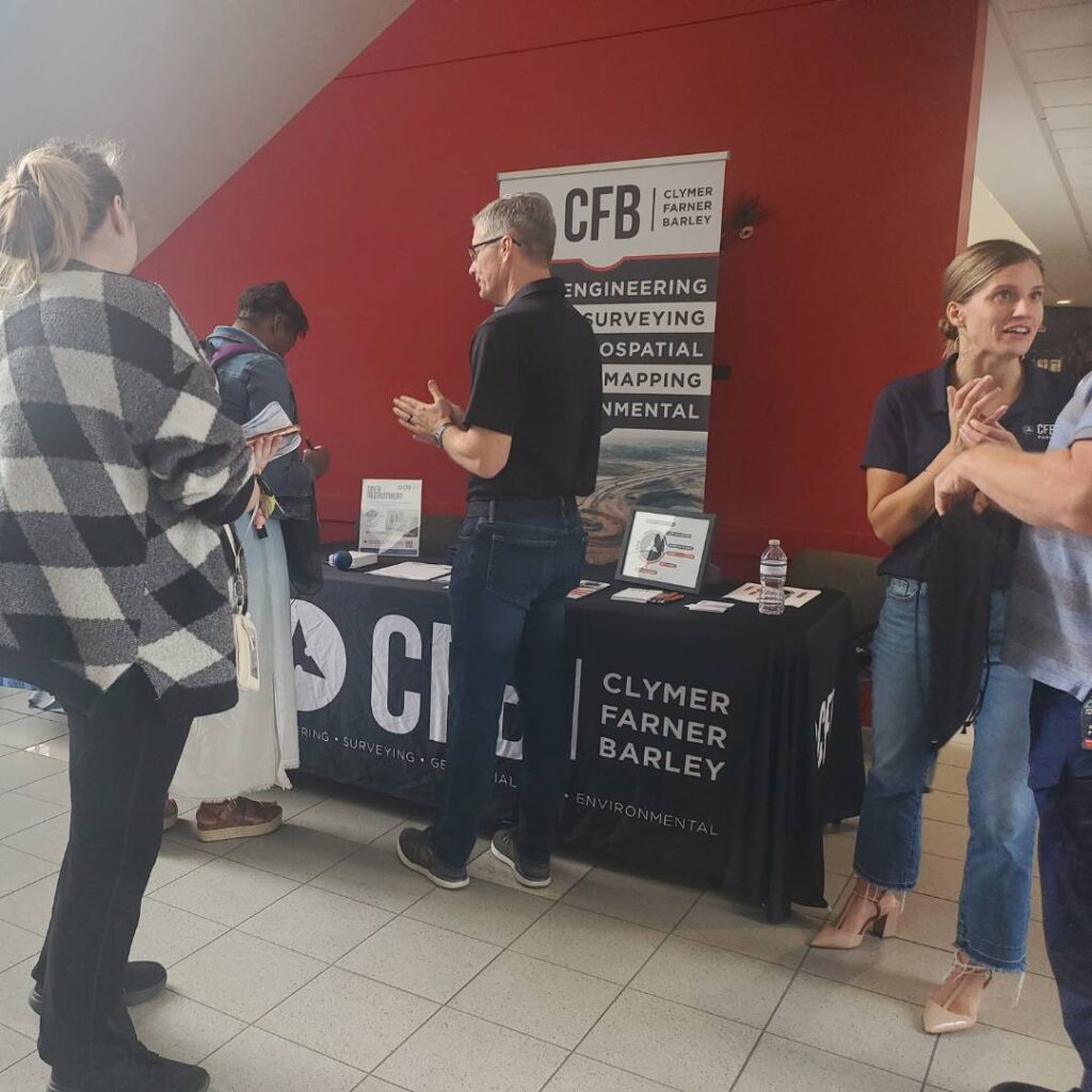 Several CFB Professionals talking to students at GIS DAY