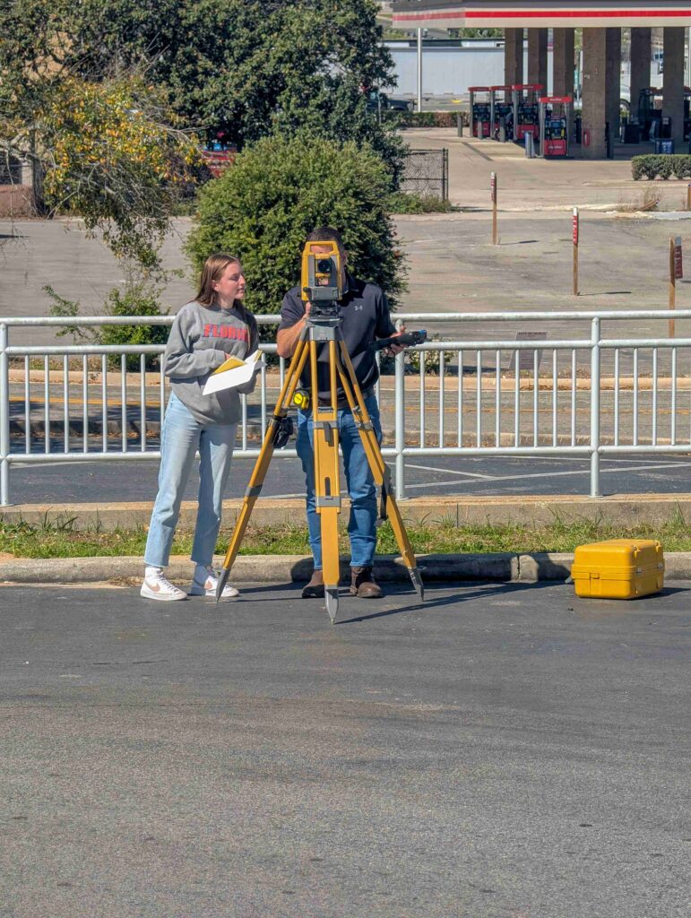 Jeremy Hallick, PSM explains data collection to UF geomatics student in Ocala Florida. 