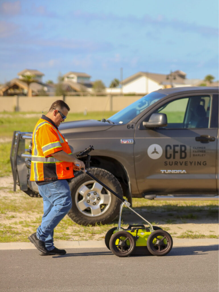 SUE crew member operating Impulse Radar ground penetrating radar (GPR) unit.