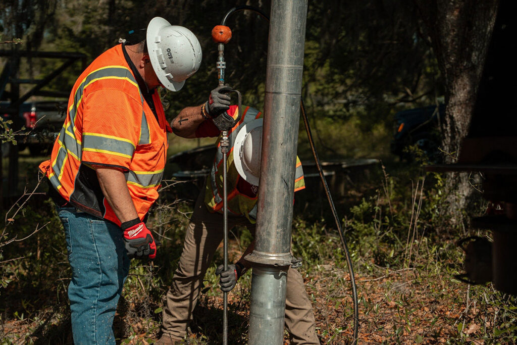 CFB Surveying SUE team operating vacuum excavation to expose utilities
